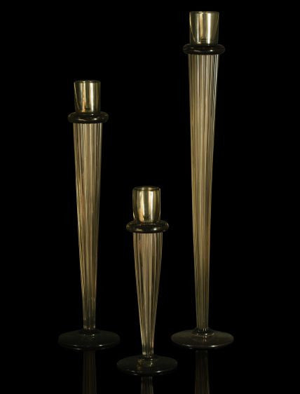 Tall amber glass candleholders